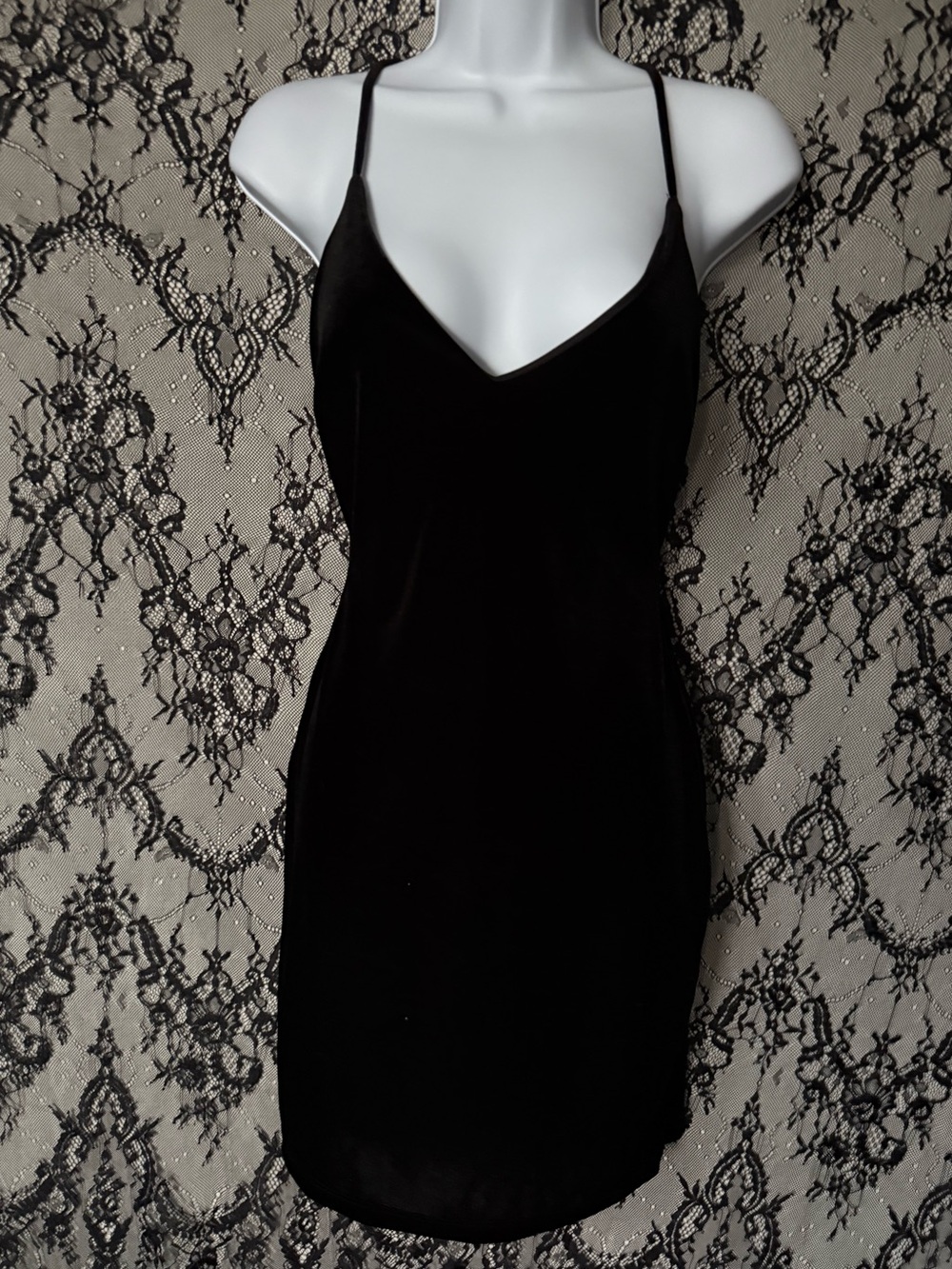 Epiphany Black velvet mini dress with spaghetti straps and a V-neckline